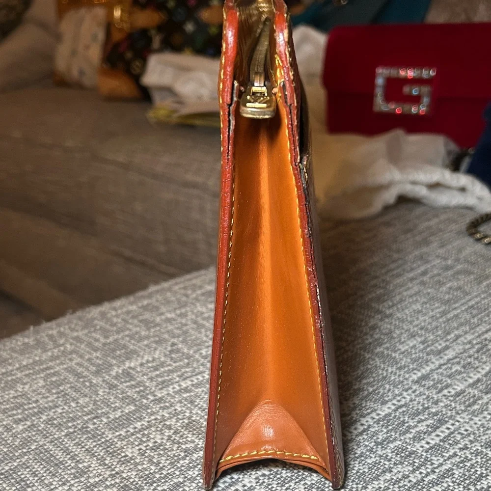268. Louis Vuitton Epi Brown Pochette Homme